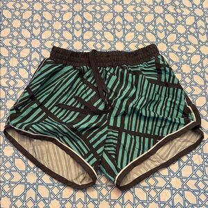 Be Inspired Black and Green Striped Athletic Shorts